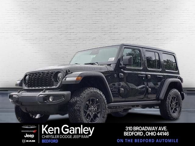2026 Jeep Wrangler WRANGLER 4-DOOR WILLYS in Black Clear-Coat Exterior Paint — front three-quarter view