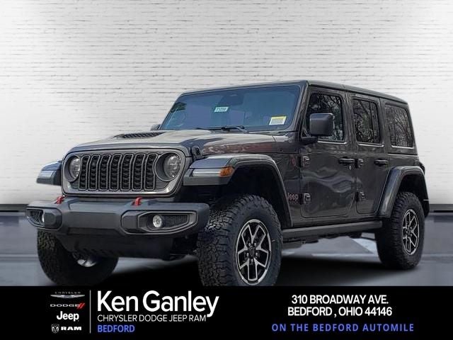 2026 Jeep Wrangler WRANGLER 4-DOOR RUBICON in Granite Crystal Metallic Clear-Coat Exterior Paint — front three-quarter view