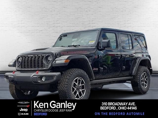 2026 Jeep Wrangler WRANGLER 4-DOOR RUBICON in Black Clear-Coat Exterior Paint — front three-quarter view