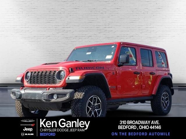 2026 Jeep Wrangler WRANGLER 4-DOOR RUBICON in Firecracker Red Clear-Coat Exterior Paint — front three-quarter view