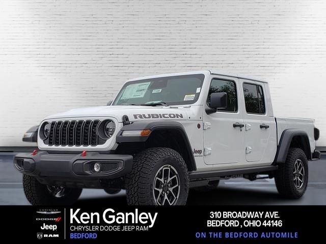 2026 Jeep Gladiator GLADIATOR RUBICON 4X4 in Bright White Clear-Coat Exterior Paint — front three-quarter view