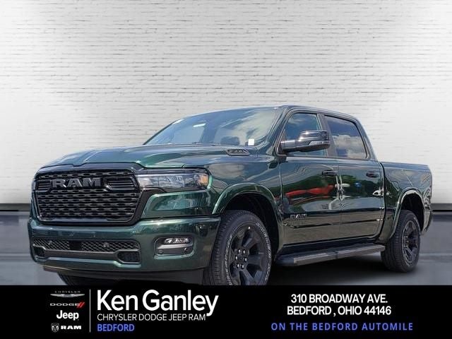 2026 RAM Ram 1500 RAM 1500 BIG HORN CREW CAB 4X4 5'7' BOX in Serrano-Green Metallic Exterior Paint — front three-quarter view