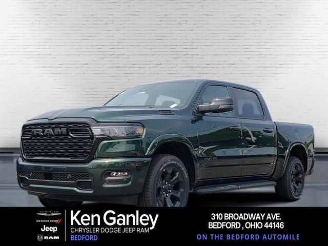 2026 RAM Ram 1500 RAM 1500 BIG HORN CREW CAB 4X4 5'7' BOX in Serrano-Green Metallic Exterior Paint — front three-quarter view