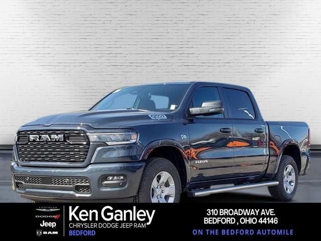 2026 RAM Ram 1500 RAM 1500 BIG HORN CREW CAB 4X4 5'7' BOX in Forged Blue Metallic Exterior Paint — front three-quarter view
