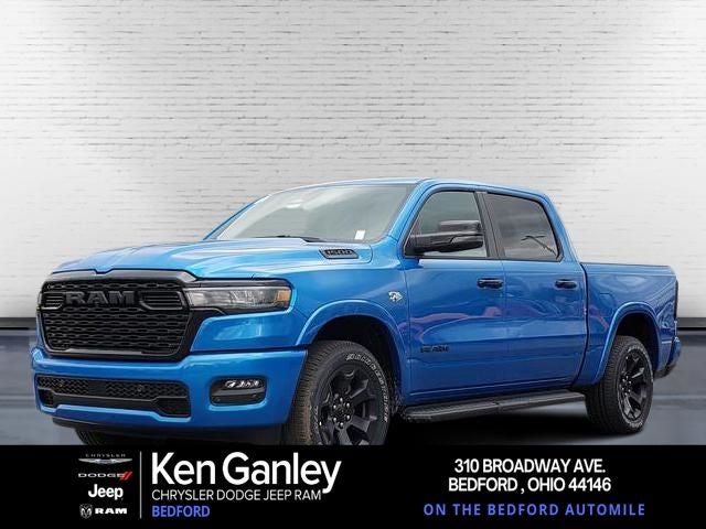2026 RAM Ram 1500 RAM 1500 BIG HORN CREW CAB 4X4 5'7' BOX in Hydro Blue Pearl-Coat Exterior Paint — front three-quarter view