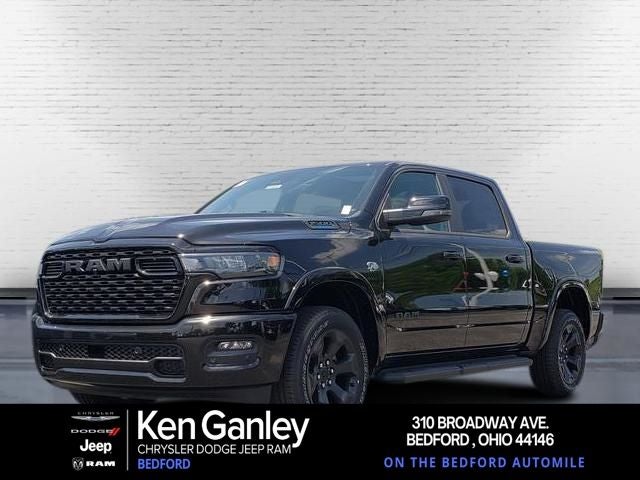 2026 RAM Ram 1500 RAM 1500 BIG HORN CREW CAB 4X4 5'7' BOX in Diamond Black Crystal Pearl-Coat Exterior Paint — front three-quarter view