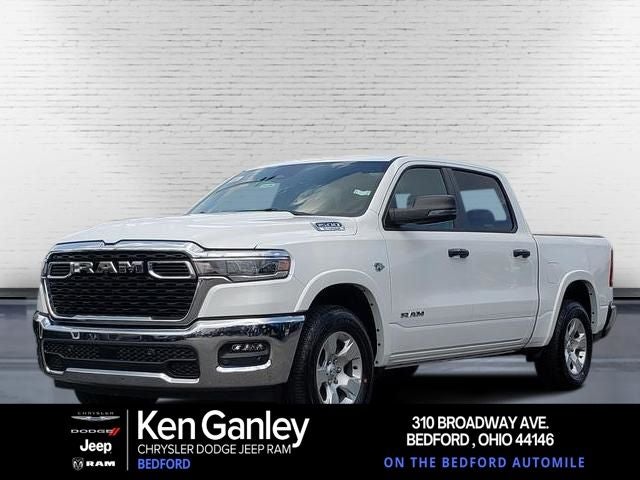 2026 RAM Ram 1500 RAM 1500 BIG HORN CREW CAB 4X4 5'7' BOX in Bright White Clear-Coat Exterior Paint — front three-quarter view