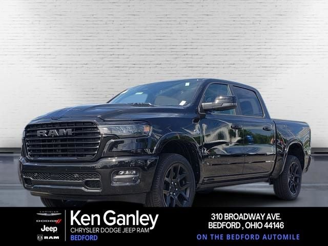 2026 RAM Ram 1500 RAM 1500 LARAMIE CREW CAB 4X4 5'7' BOX in Diamond Black Crystal Pearl-Coat Exterior Paint — front three-quarter view