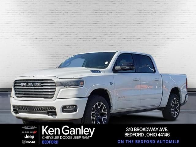 2026 RAM Ram 1500 RAM 1500 LARAMIE CREW CAB 4X4 5'7' BOX in Bright White Clear-Coat Exterior Paint — front three-quarter view