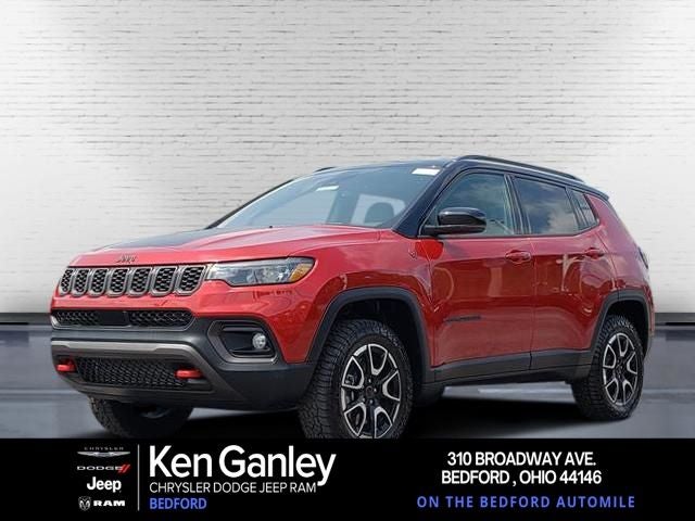 2026 Jeep Compass COMPASS TRAILHAWK 4X4 in Red Hot Pearl-Coat Exterior Paint — front three-quarter view