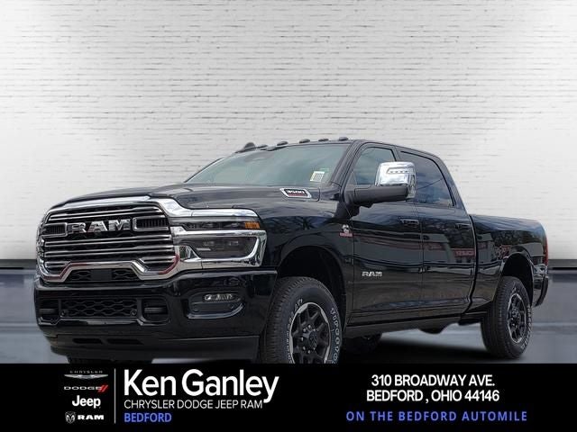 2026 RAM Ram 3500 RAM 3500 LARAMIE CREW CAB 4X4 6'4' BOX in Diamond Black Crystal Pearl-Coat Exterior Paint — front three-quarter view