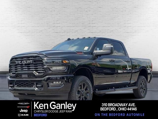 2026 RAM Ram 2500 RAM 2500 BIG HORN CREW CAB 4X4 6'4' BOX in Diamond Black Crystal Pearl-Coat Exterior Paint — front three-quarter view