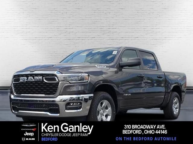 2026 RAM Ram 1500 RAM 1500 BIG HORN CREW CAB 4X4 5'7' BOX in Granite Crystal Metallic Clear-Coat Exterior Paint — front three-quarter view