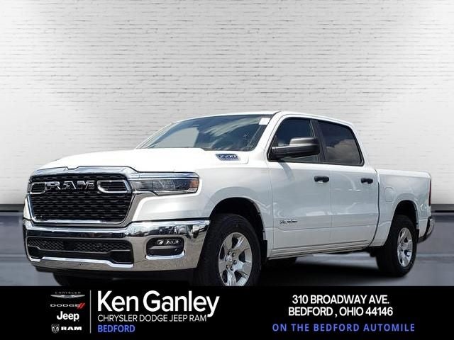 2026 RAM Ram 1500 RAM 1500 BIG HORN CREW CAB 4X4 5'7' BOX in Bright White Clear-Coat Exterior Paint — front three-quarter view