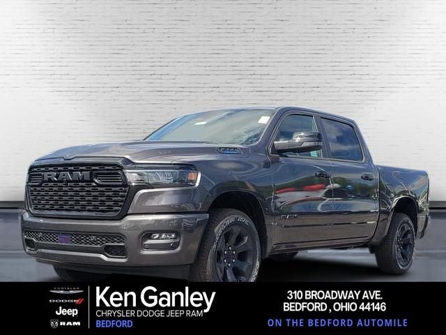 2026 RAM Ram 1500 RAM 1500 BIG HORN CREW CAB 4X4 5'7' BOX in Granite Crystal Metallic Clear-Coat Exterior Paint — front three-quarter view