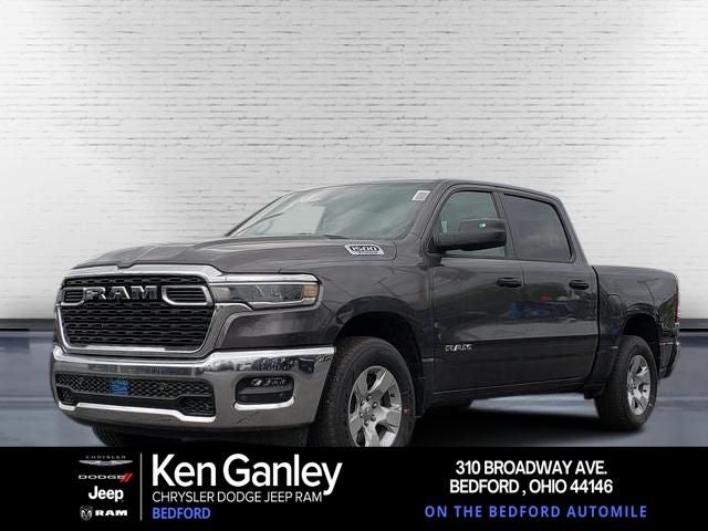 2026 RAM Ram 1500 RAM 1500 BIG HORN CREW CAB 4X4 5'7' BOX in Granite Crystal Metallic Clear-Coat Exterior Paint — front three-quarter view