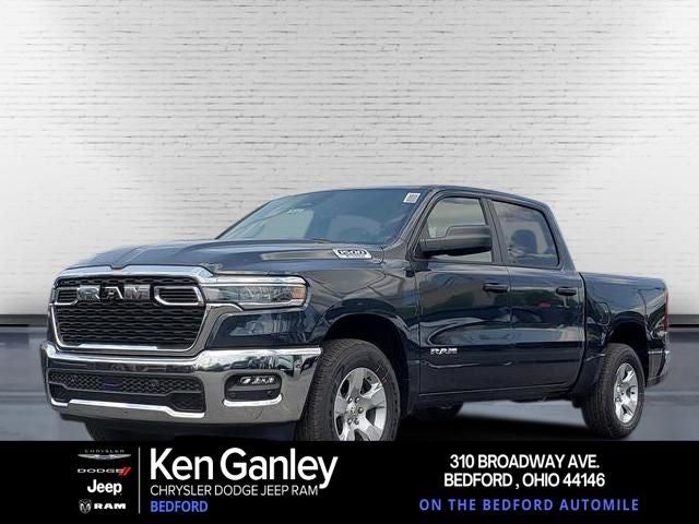 2026 RAM Ram 1500 RAM 1500 BIG HORN CREW CAB 4X4 5'7' BOX in Forged Blue Metallic Exterior Paint — front three-quarter view