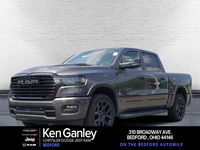 2026 RAM Ram 1500 RAM 1500 LARAMIE CREW CAB 4X4 5'7' BOX in Granite Crystal Metallic Clear-Coat Exterior Paint — front three-quarter view