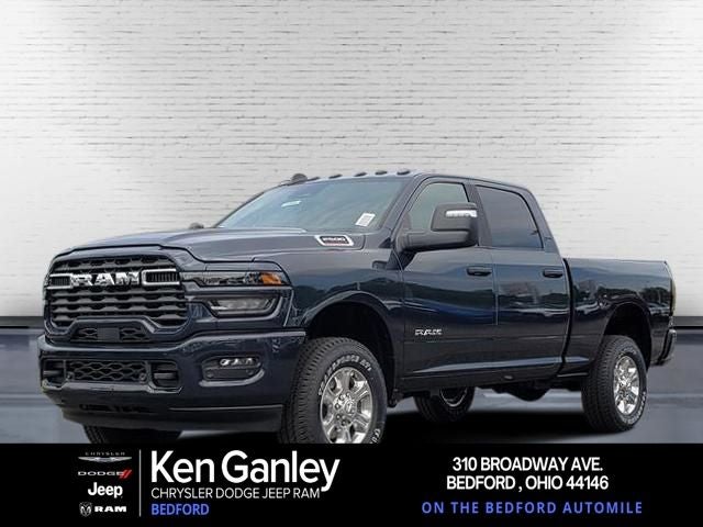 2026 RAM Ram 2500 RAM 2500 BIG HORN CREW CAB 4X4 6'4' BOX in Forged Blue Metallic Exterior Paint — front three-quarter view