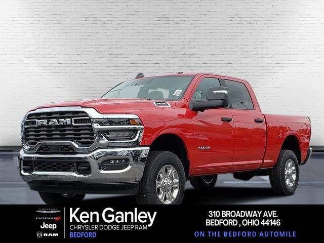 2026 RAM Ram 2500 RAM 2500 BIG HORN CREW CAB 4X4 6'4' BOX in Flame Red Clear-Coat Exterior Paint — front three-quarter view