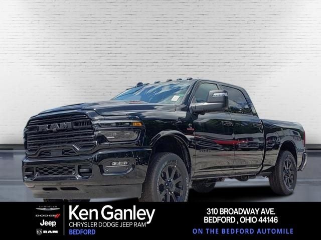2026 RAM Ram 2500 RAM 2500 LARAMIE CREW CAB 4X4 6'4' BOX in Diamond Black Crystal Pearl-Coat Exterior Paint — front three-quarter view