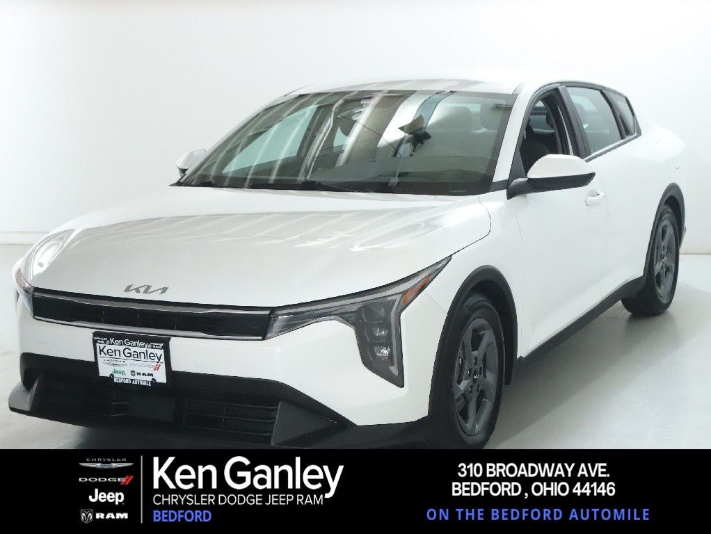2025 Kia K4 LXS in Snow White Pearl — front three-quarter view